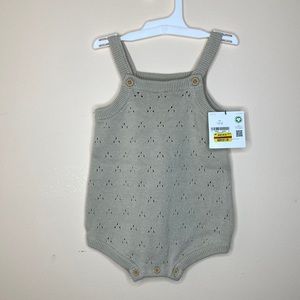 Baby crocheted one piece.